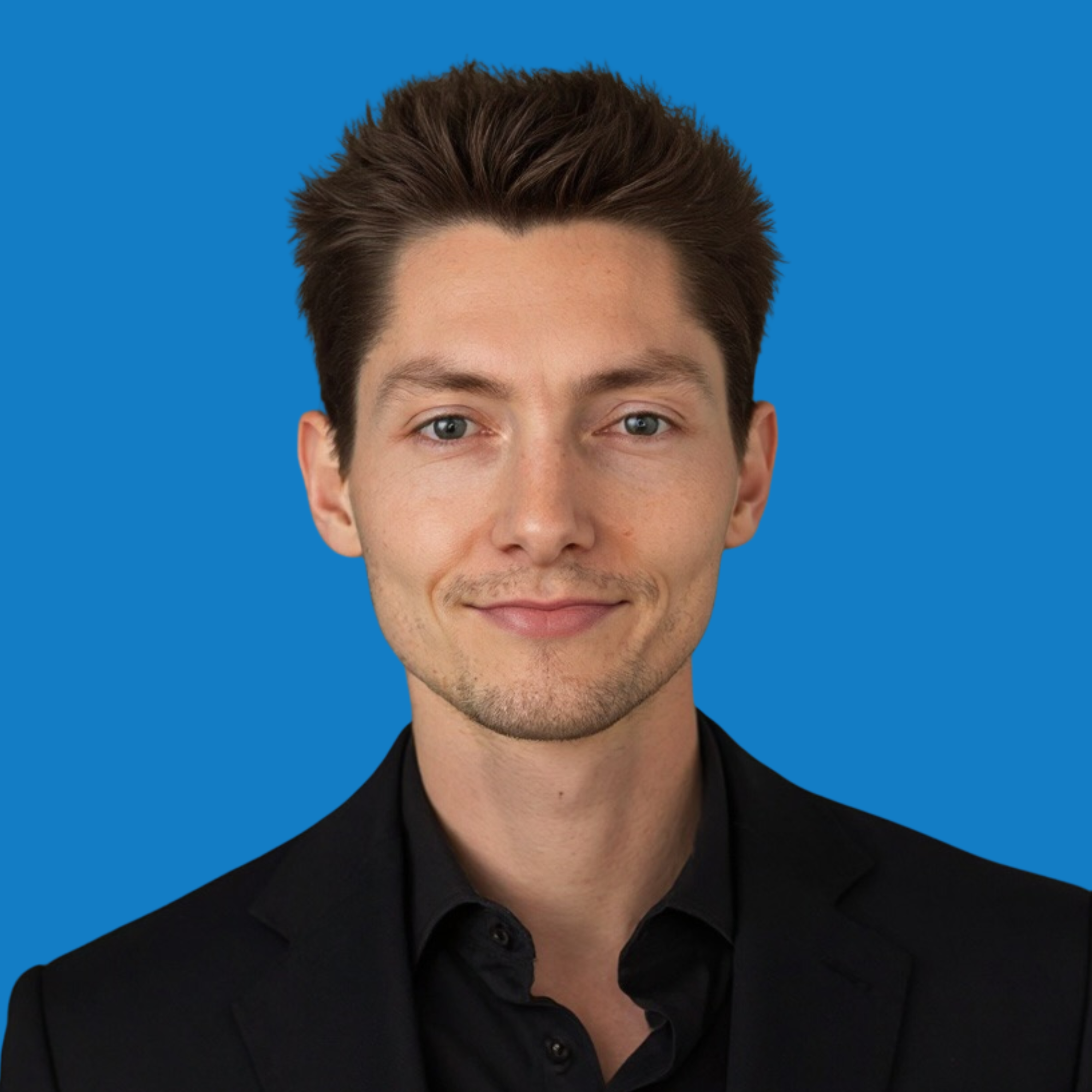 Square JL Headshot light blue